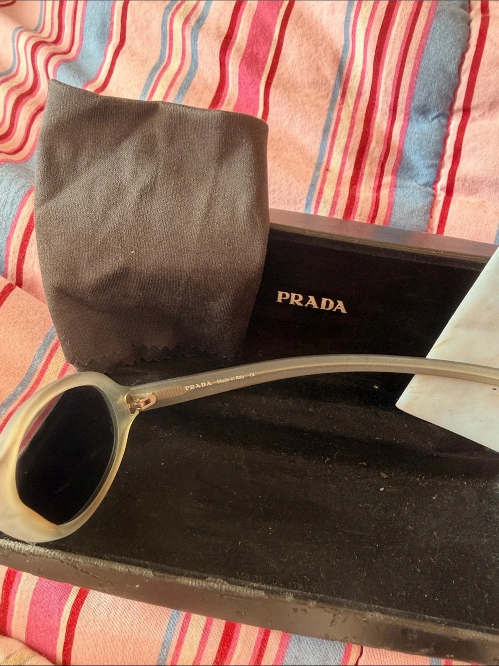 Prada Silver Oval Sunglasses with Brown-Tinted Lenses